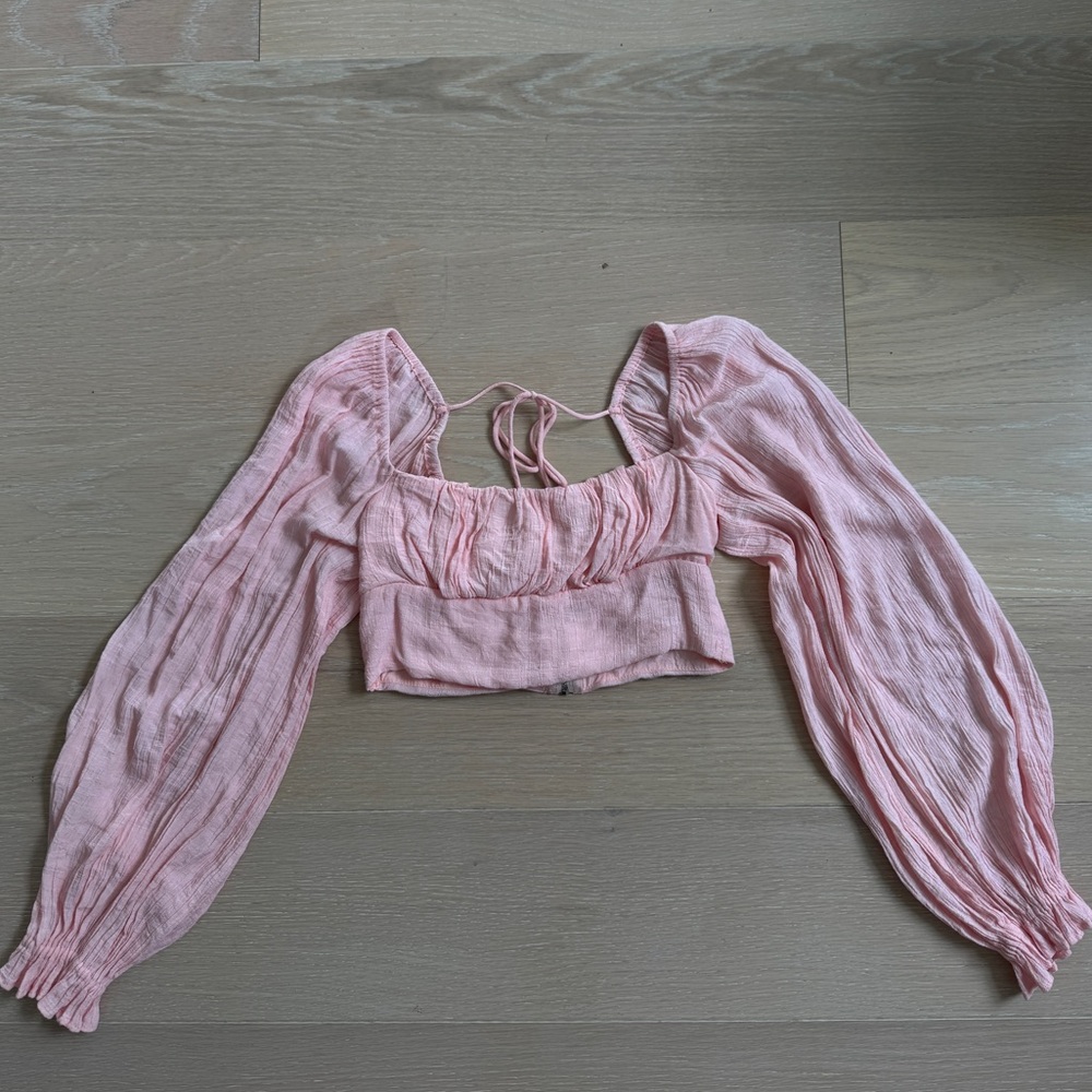 Pink cropped long sleeve blouse